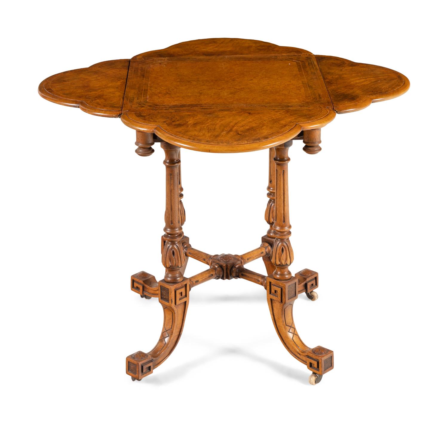 A Neoclassical Walnut Drop-Leaf Table