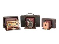 [EARLY PHOTOGRAPHY] 3 late 19th-early 20th century cameras, highlighted by Stereo Solograph camera.
