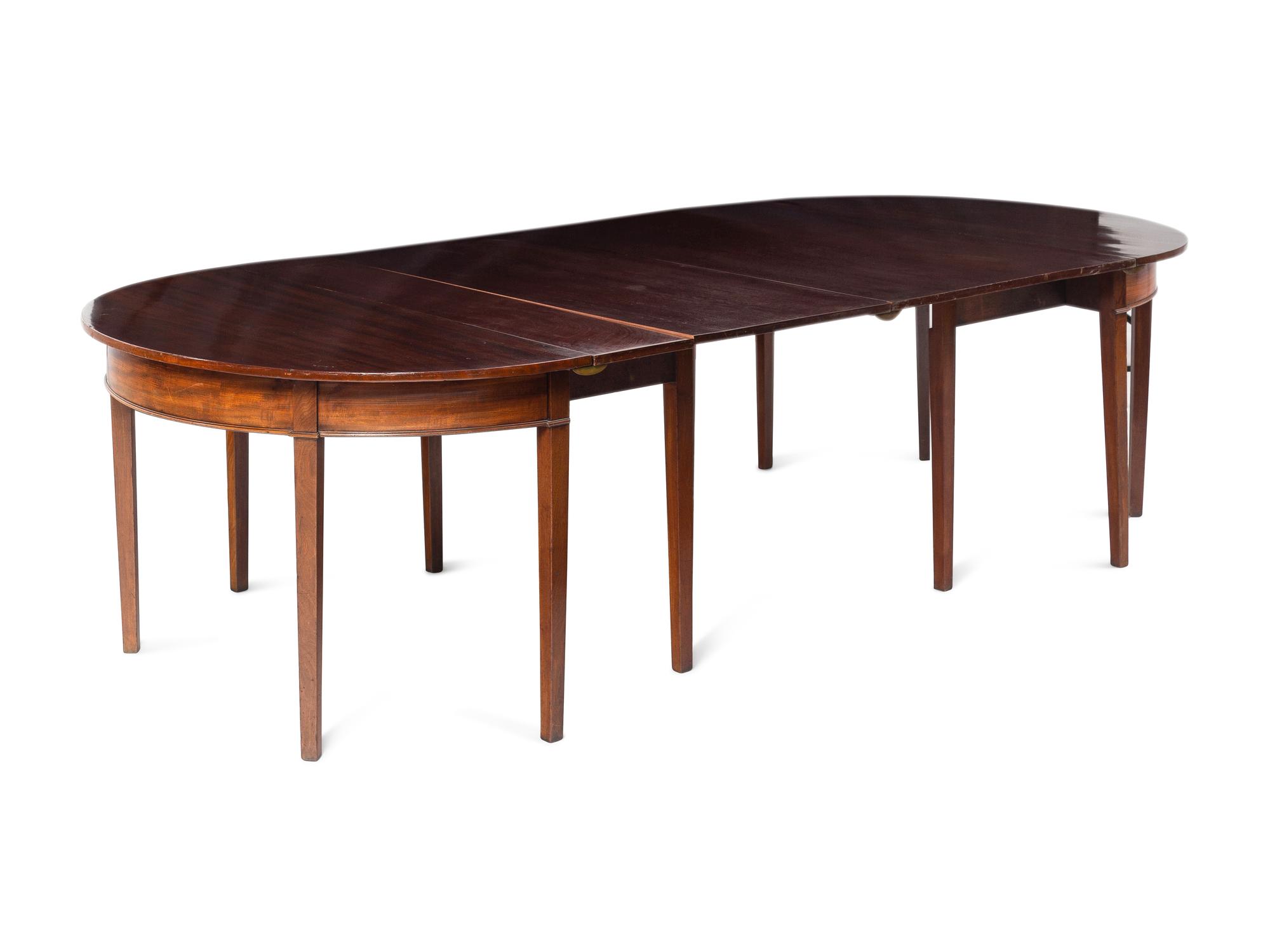 A Pair of George III Mahogany Demilune Console Tables Converting to a Dining Table