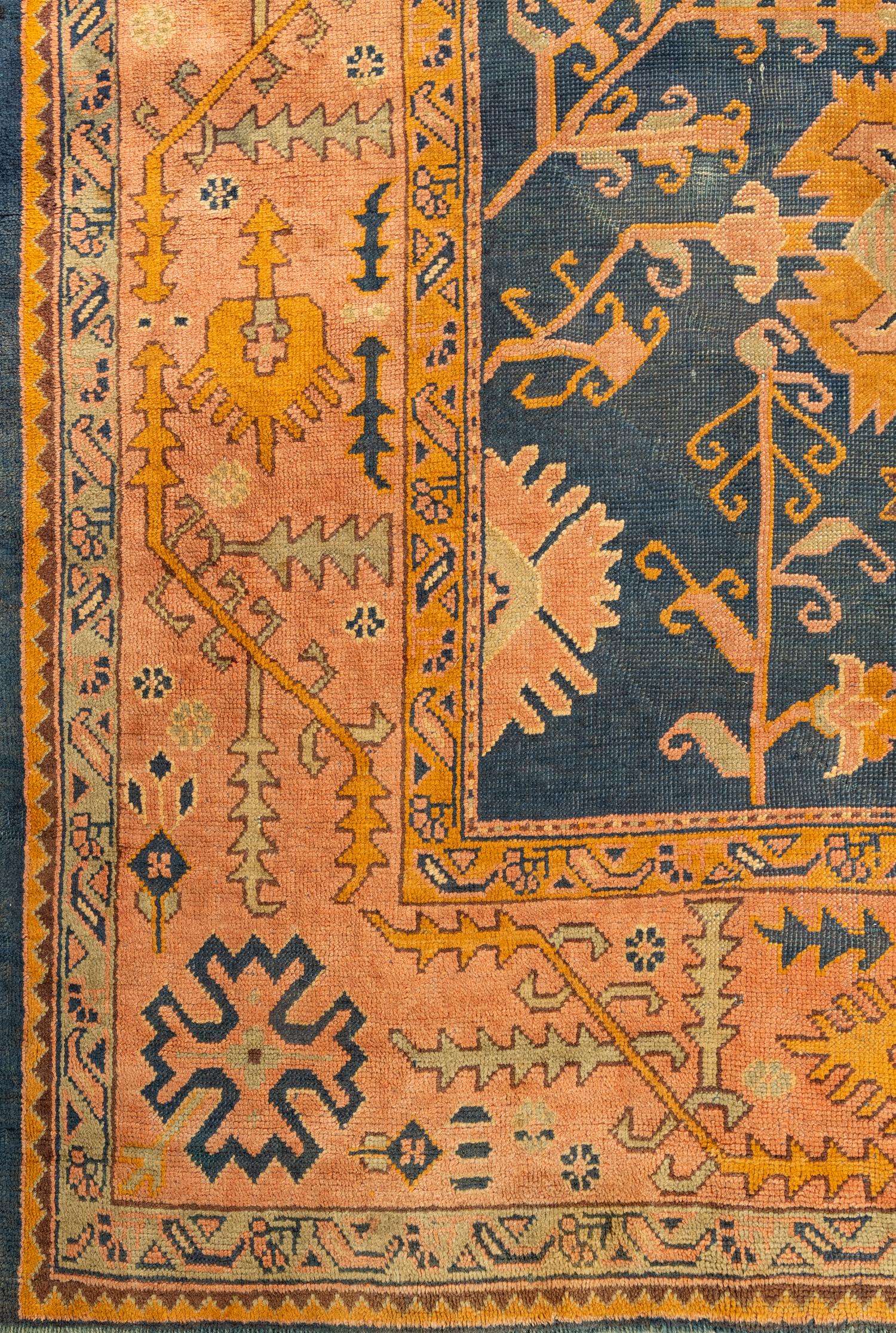 An Oushak Wool Rug