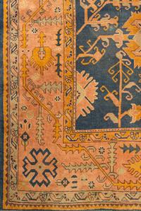 An Oushak Wool Rug