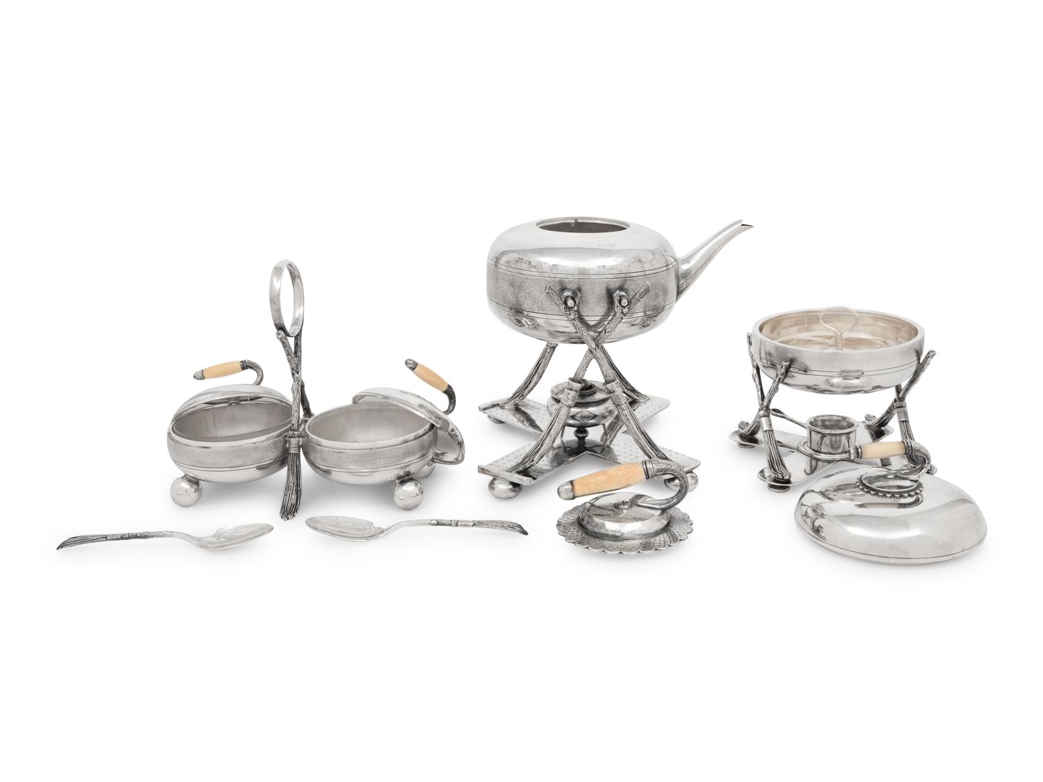 A Group of Three Curling Stone-Form Silver-Plate Table Articles