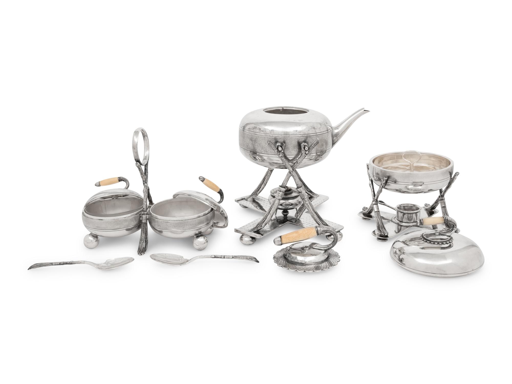 A Group of Three Curling Stone-Form Silver-Plate Table Articles
