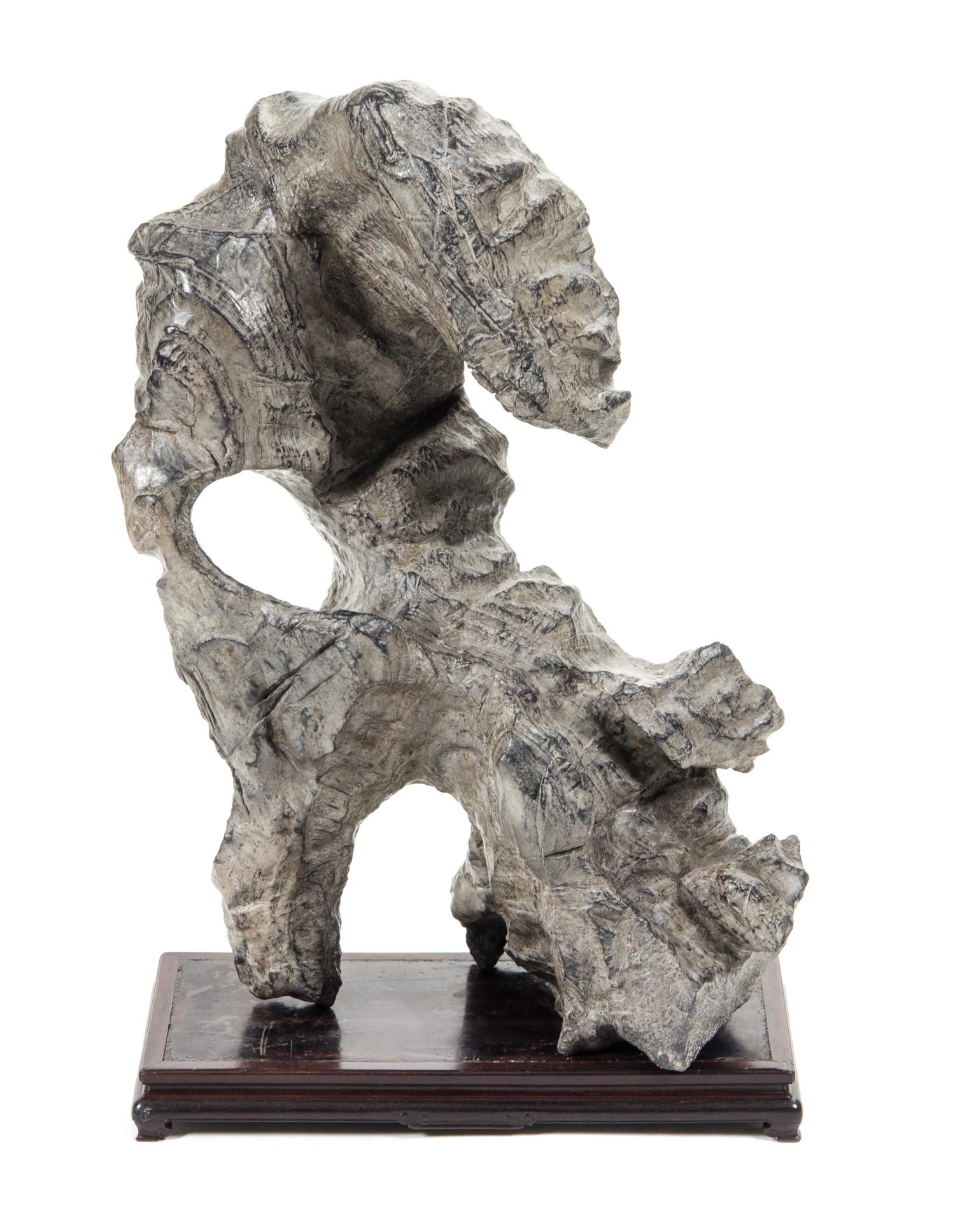 A Scholar's Rock Height overall 30 inches. — 20TH CENTURY