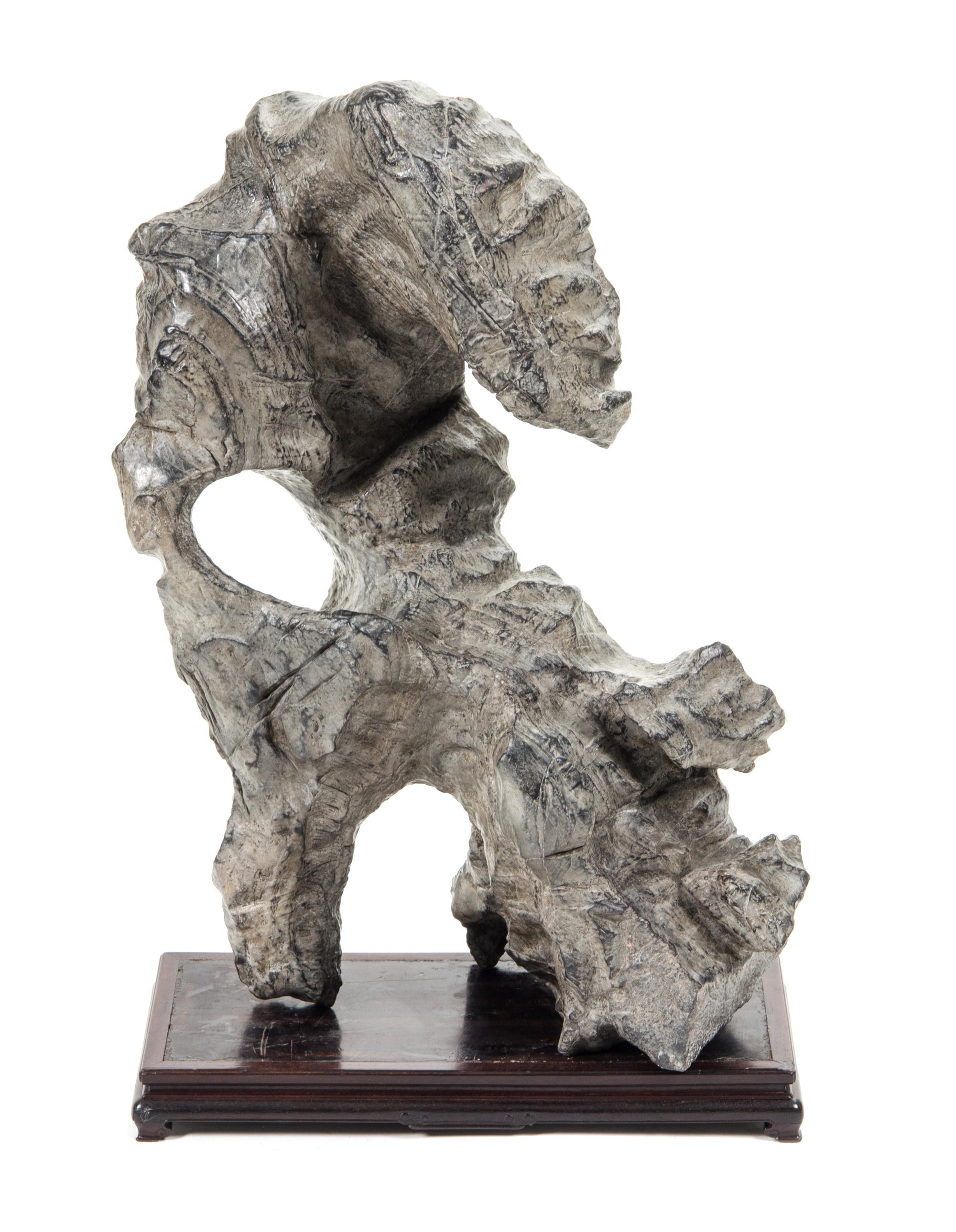 A Scholar's Rock Height overall 30 inches. — 20TH CENTURY