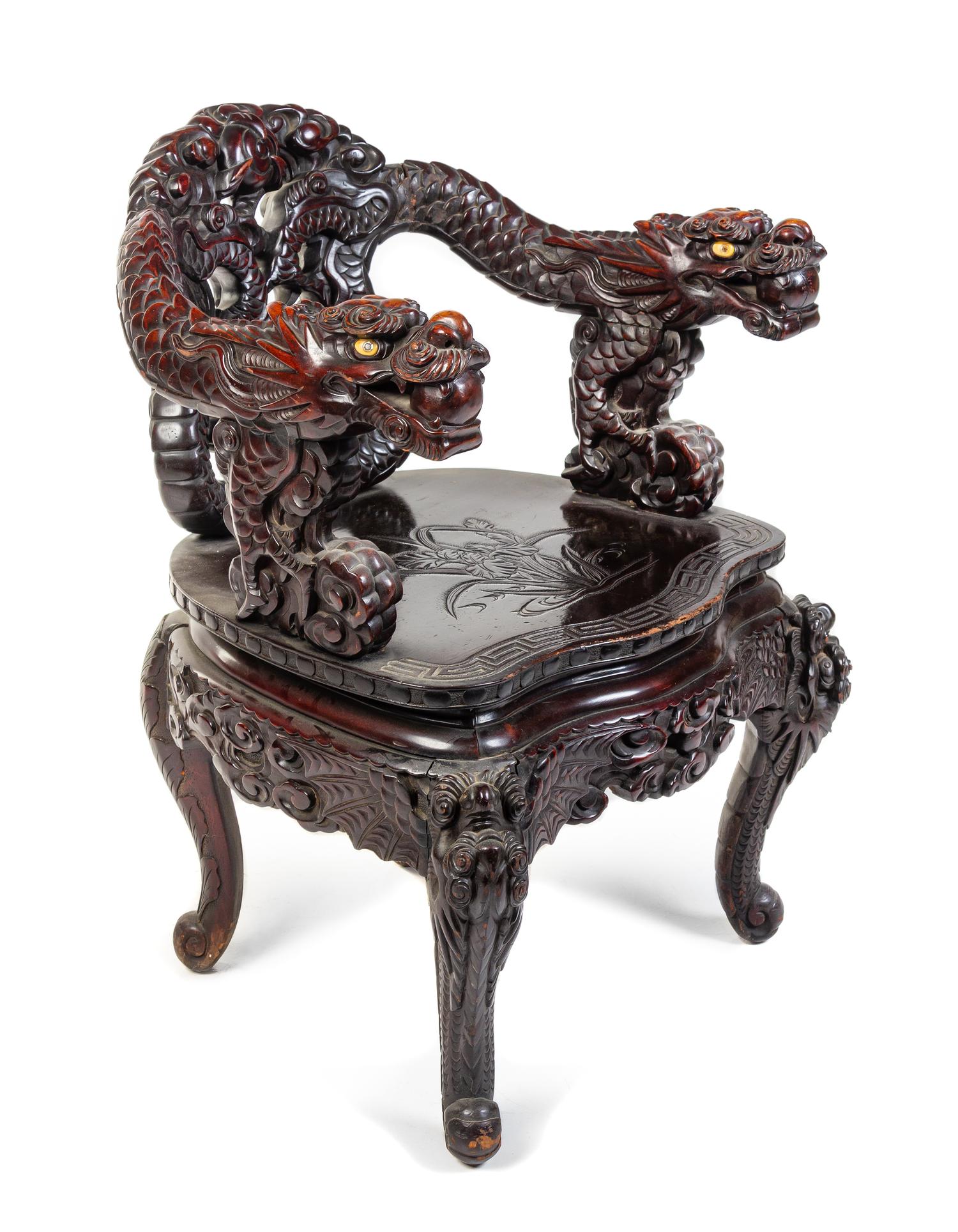 A Japanese Carved Armchair Height 33 inches. — 20TH CENTURY