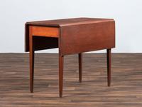 A Shaker Red-Stained Cherrywood Drop-Leaf Dining Table