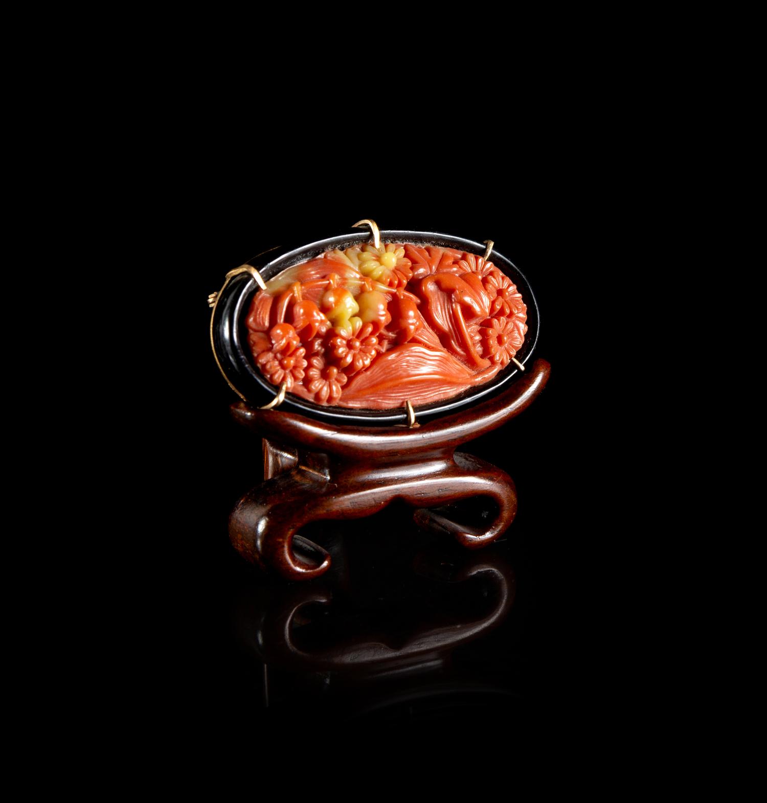 A Chinese Plastic Imitating Coral Inset Brooch