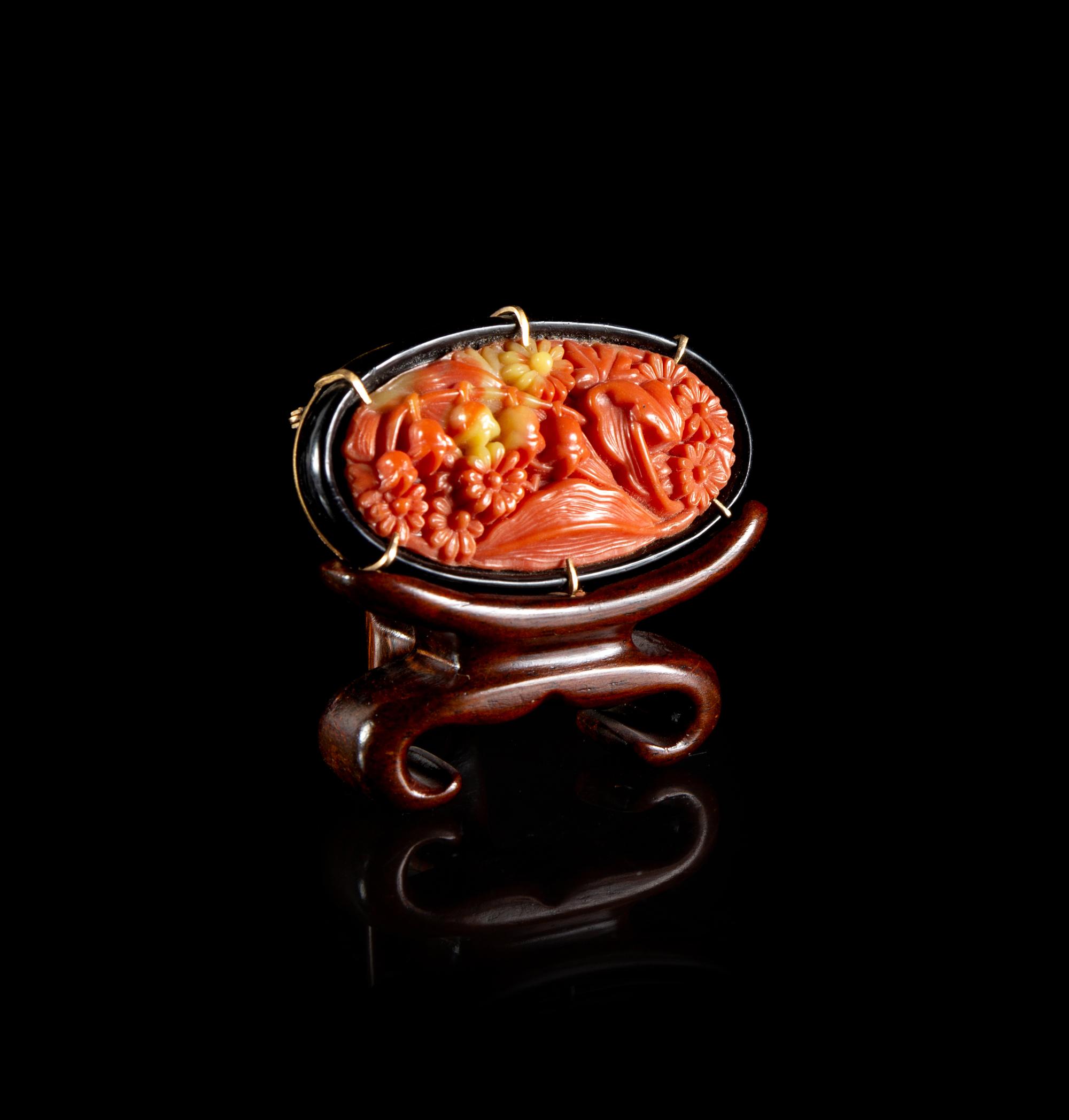 A Chinese Plastic Imitating Coral Inset Brooch
