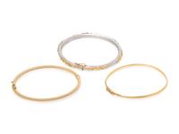 COLLECTION OF GOLD BANGLE BRACELETS