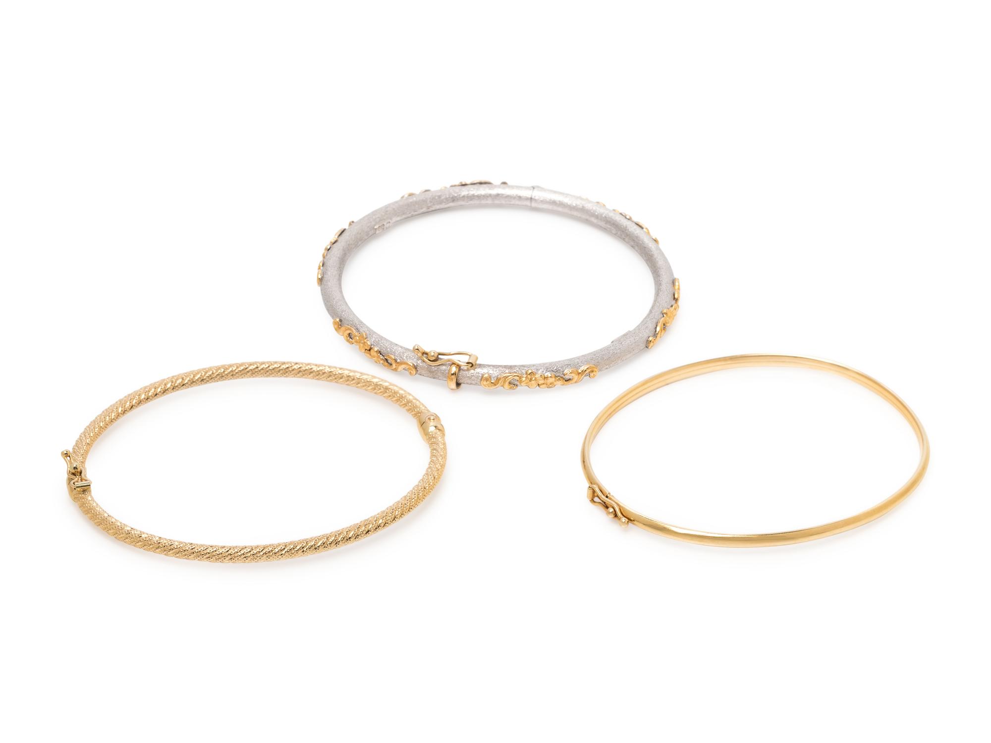 COLLECTION OF GOLD BANGLE BRACELETS