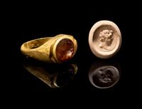 A Roman Carnelian Ring Stone with a Male Bust in Profile