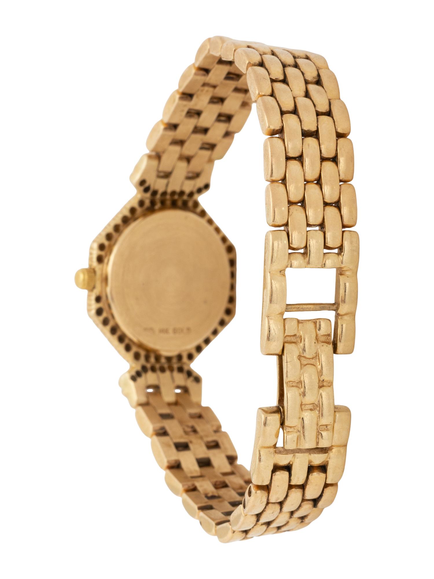 TOURNEAU, YELLOW GOLD, MOTHER-OF-PEARL, AND DIAMOND WATCH
