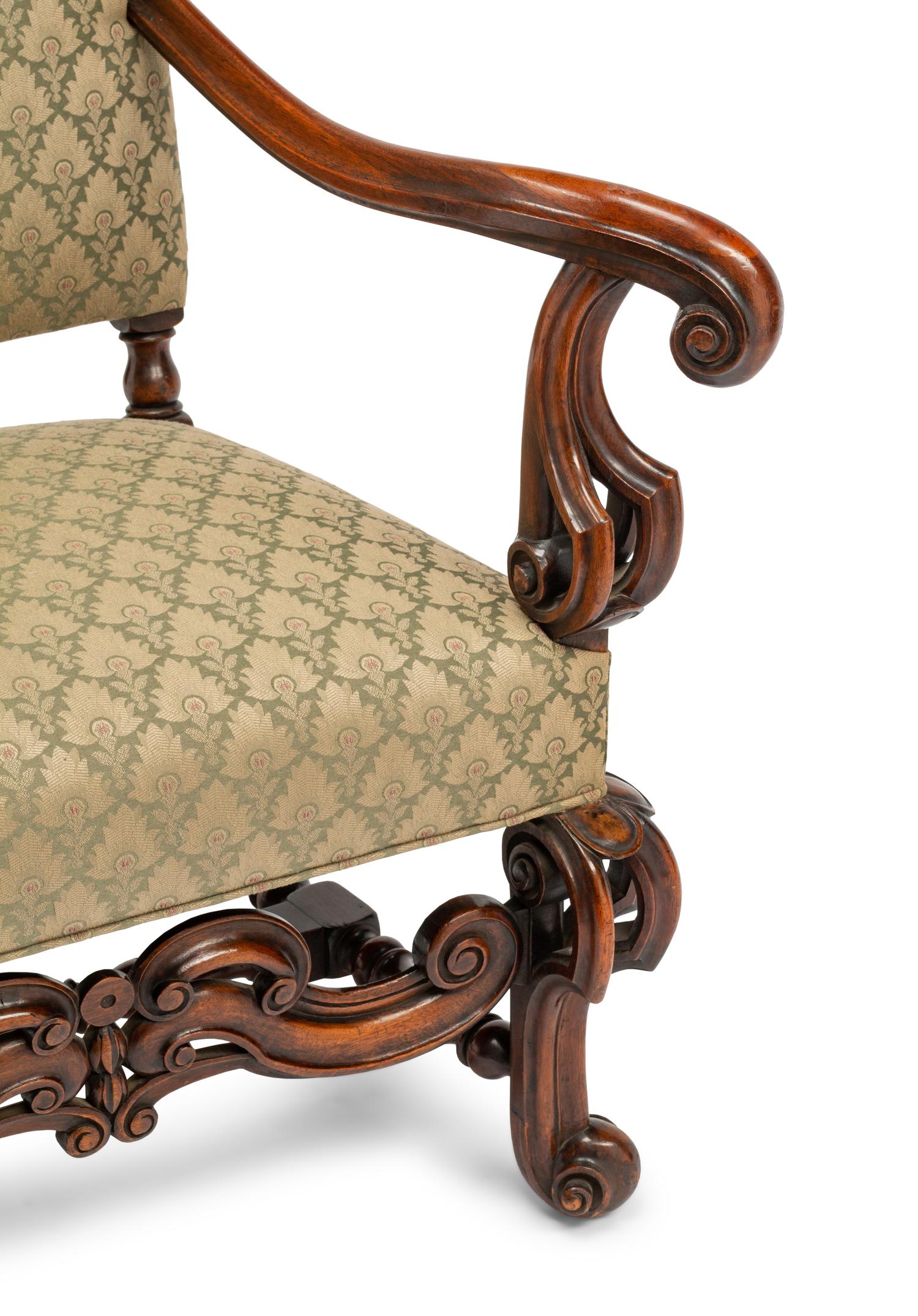 A Continental Baroque Style Carved Walnut Armchair