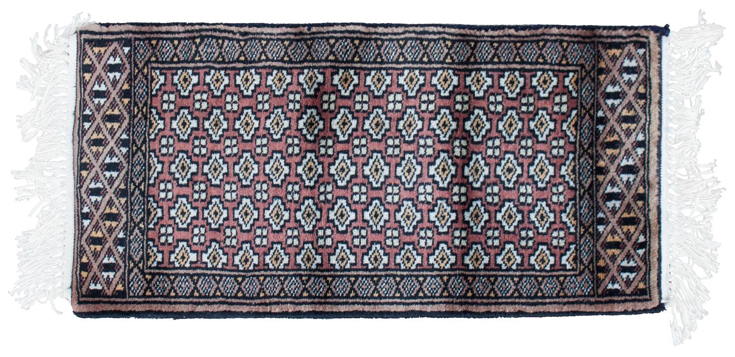 Two Senneh Wool Mats Each 2 feet x 1 foot.