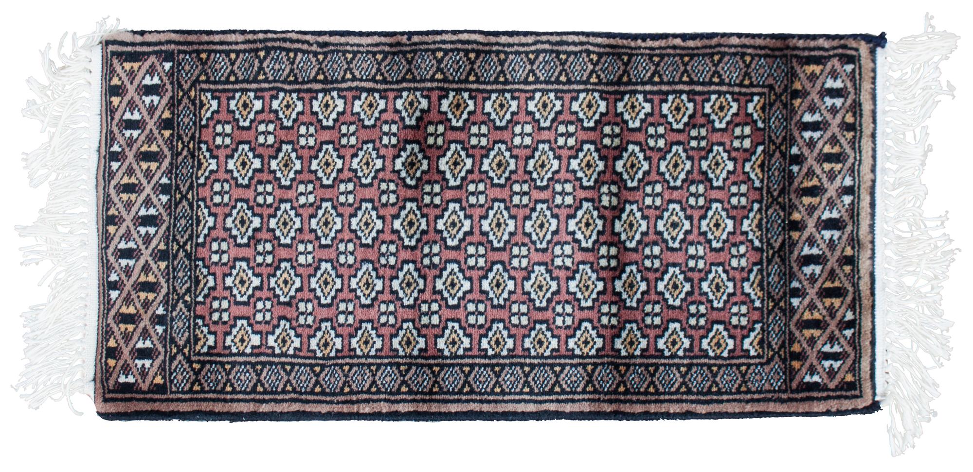 Two Senneh Wool Mats Each 2 feet x 1 foot.