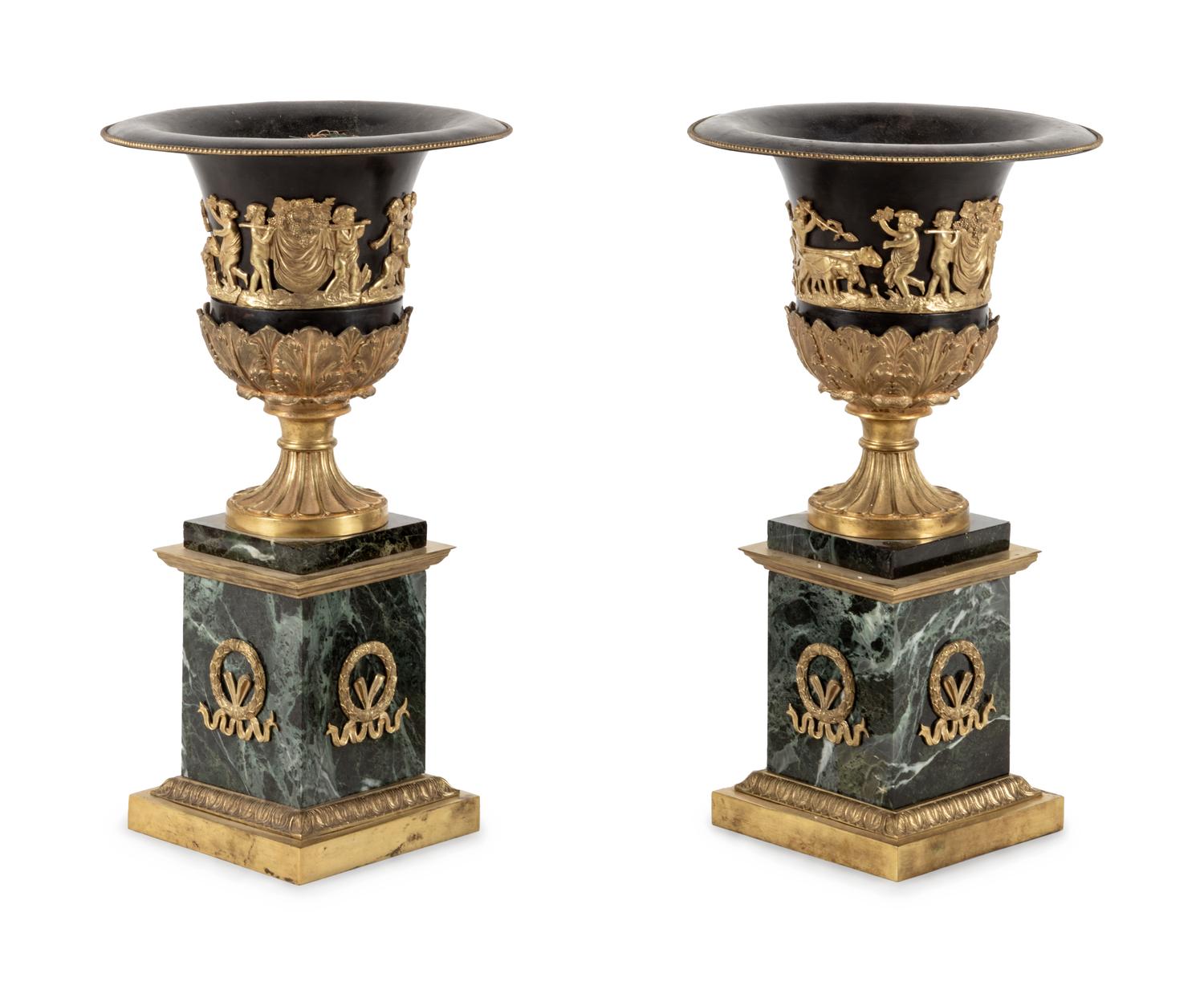 A Pair of Empire Style Gilt Bronze and Tôle Marble Urns