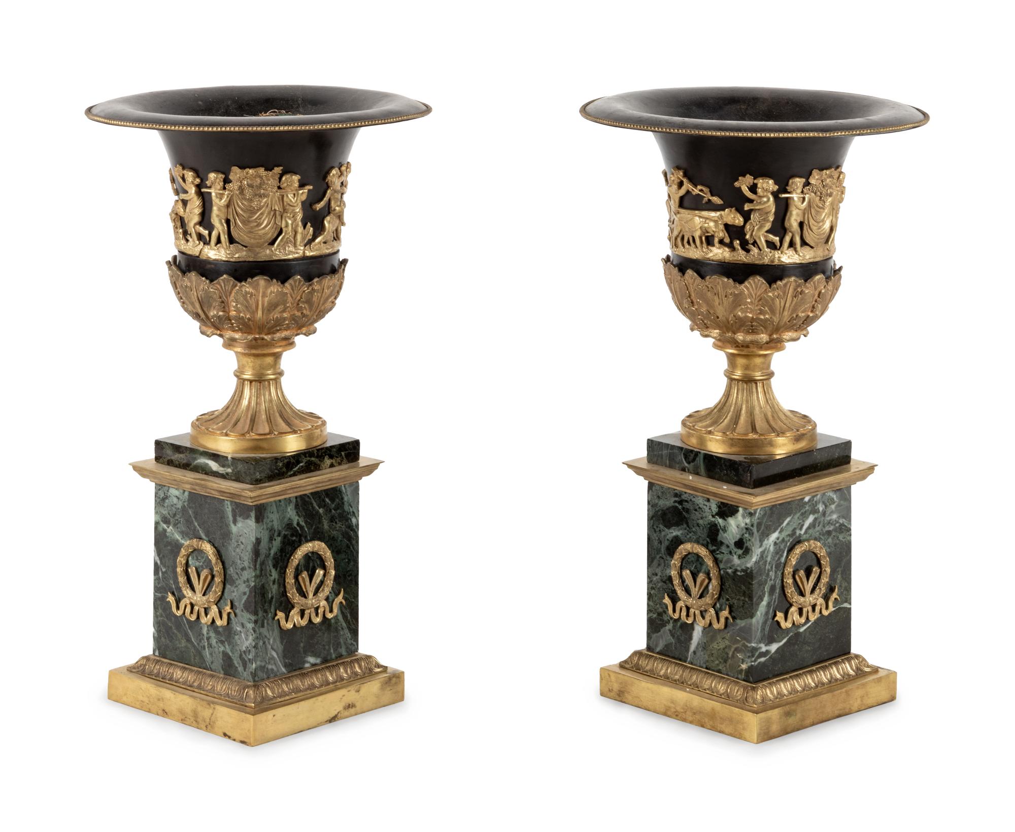 A Pair of Empire Style Gilt Bronze and Tôle Marble Urns