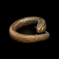 An Egyptian Gilt-Bronze Snake Ring