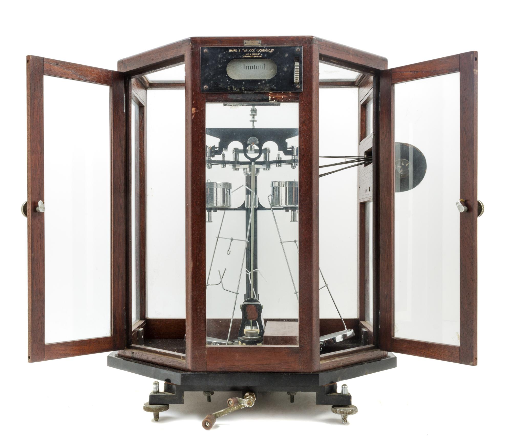 An English Cased Assayer's Balance Height of case 18 x width 16 x depth 11 inches. — BAIRD & TATLOCK, LONDON, 20TH CENTURY