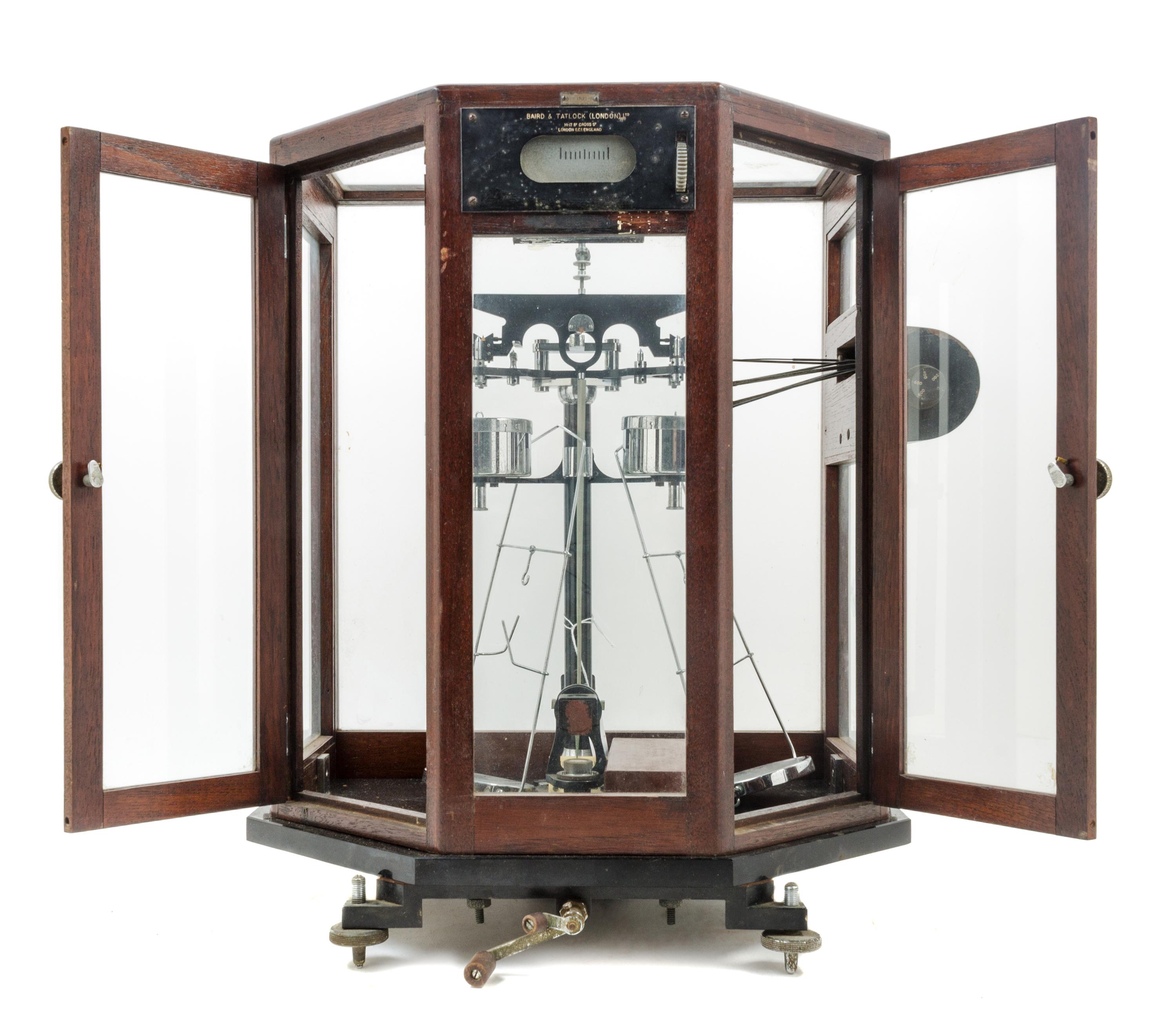 An English Cased Assayer's Balance Height of case 18 x width 16 x depth 11 inches. — BAIRD & TATLOCK, LONDON, 20TH CENTURY