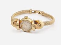A Ladies 14K Yellow Gold LeCoultre Watch