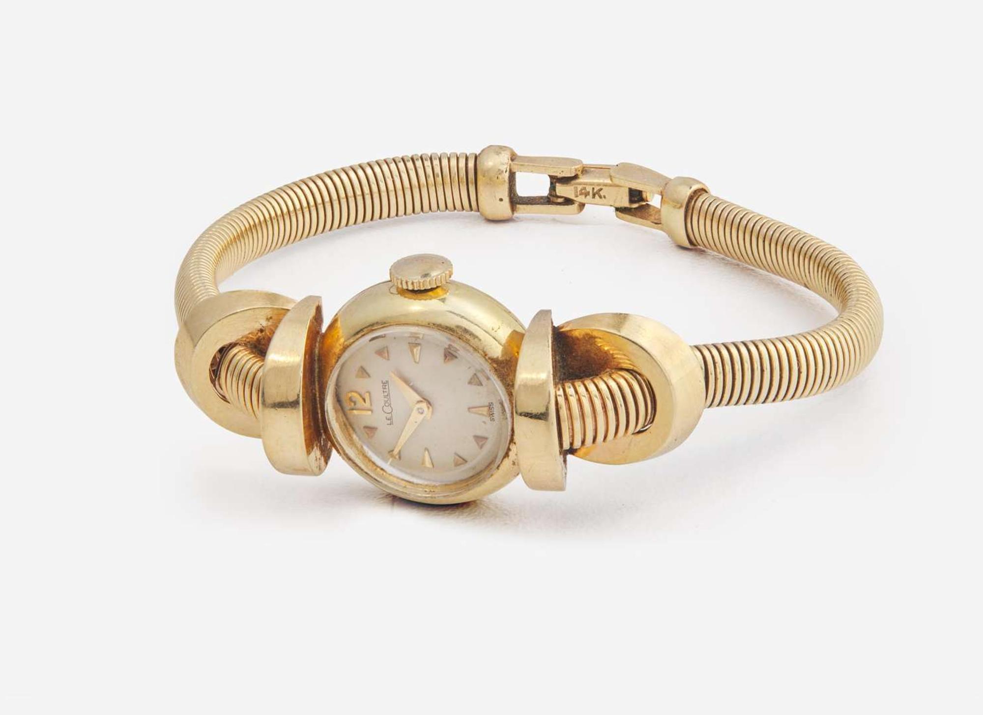 A Ladies 14K Yellow Gold LeCoultre Watch