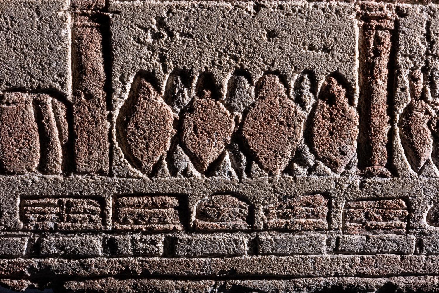 An Egyptian Polychrome Relief with Offering to the Aten