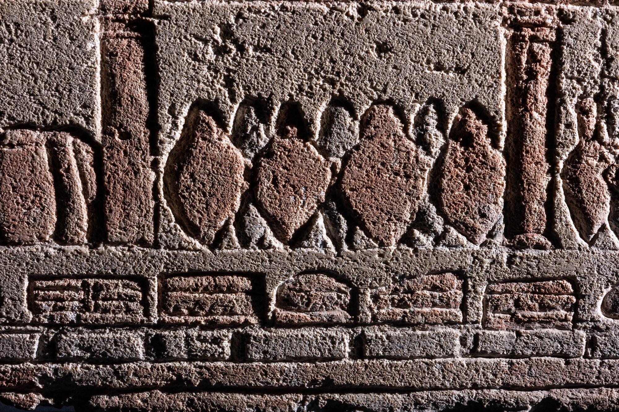 An Egyptian Polychrome Relief with Offering to the Aten