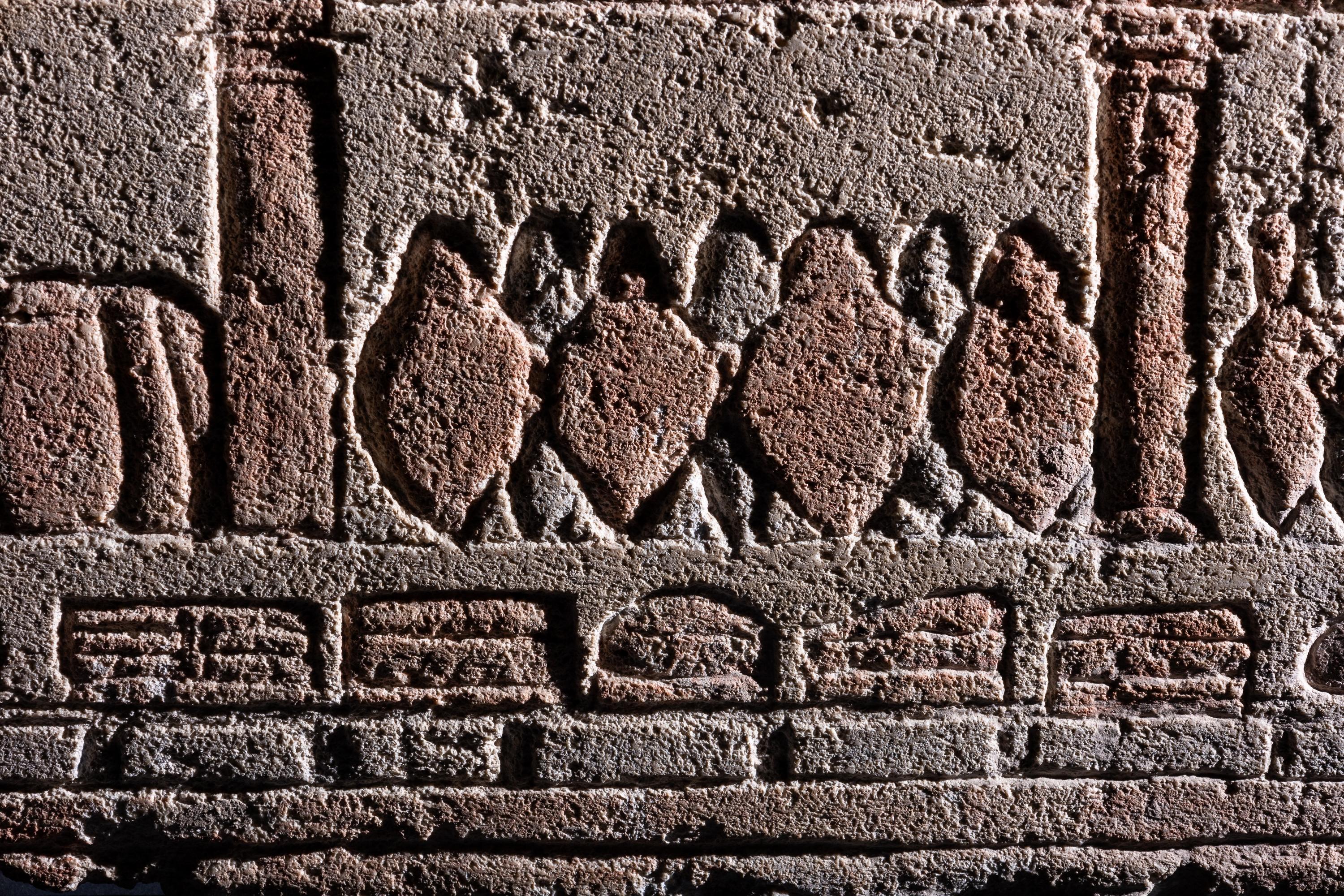 An Egyptian Polychrome Relief with Offering to the Aten