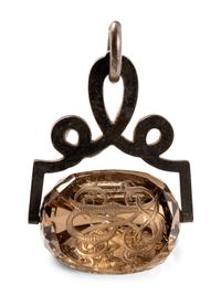 A German Carved Topaz and Gilt Metal Mounted Hand Seal