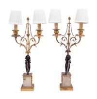 A Pair of French Gilt Metal and Marble Figural Two-Light Candelabra