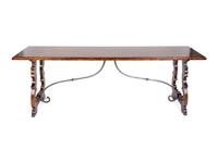 An Italian Baroque Style Mahogany Trestle Table