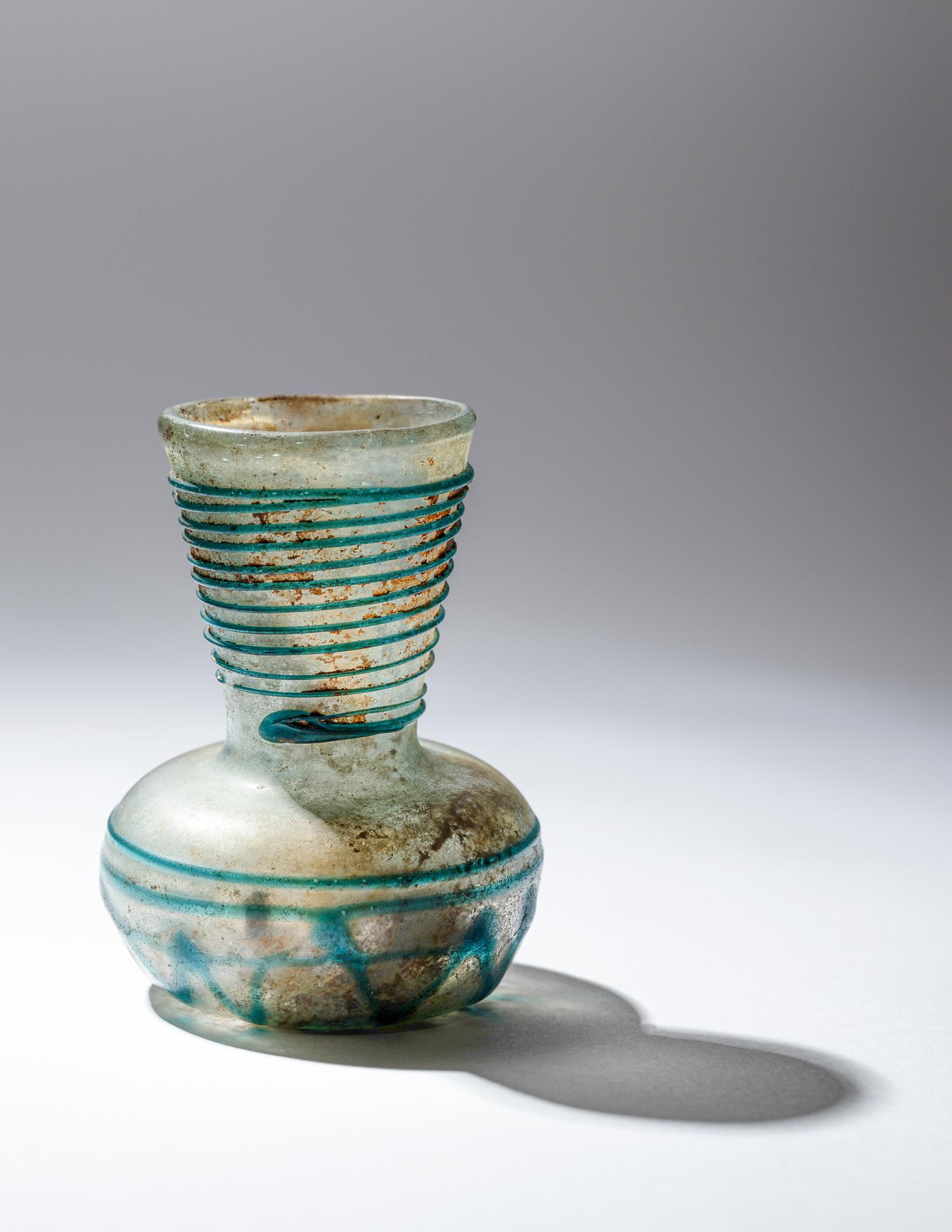 A Roman Pale Blue Glass Bottle