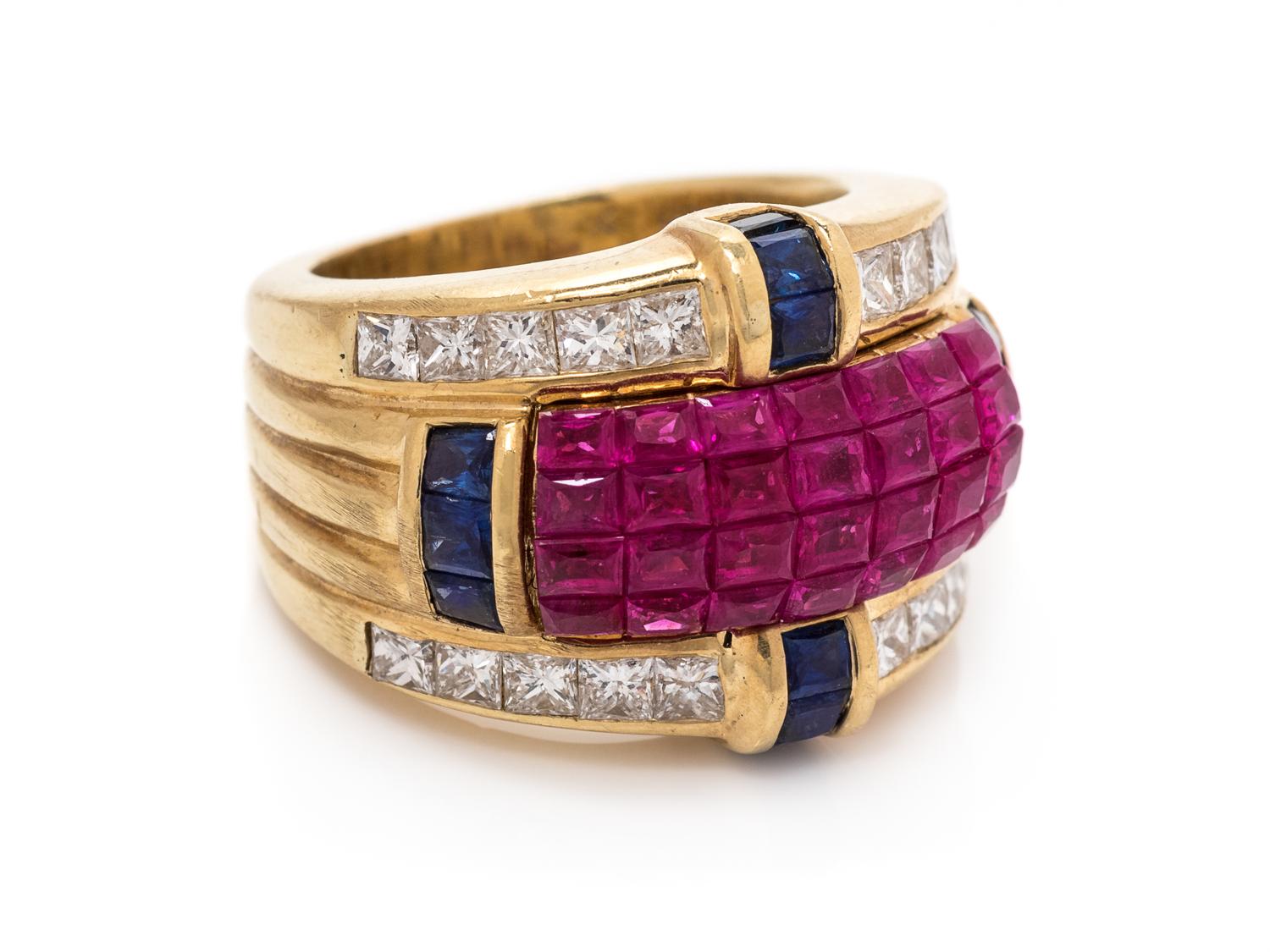 An 18 Karat Yellow Gold Ruby, Diamond and Sapphire Ring,