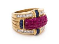 An 18 Karat Yellow Gold Ruby, Diamond and Sapphire Ring,