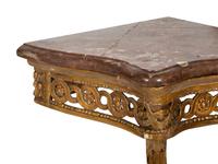 A Pair of Louis XVI Giltwood Corner Tables