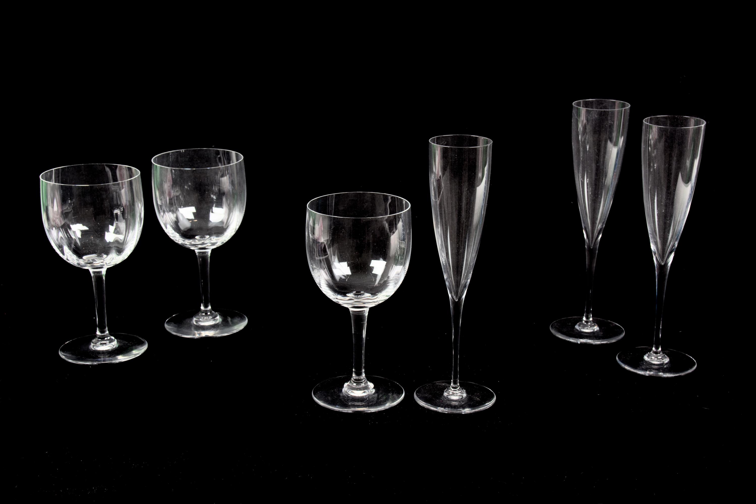A Collection of Baccarat Stemware Height of first 9 inches.