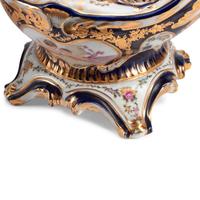 A Pair of Sèvres Style Porcelain Potpourri Vases and Covers