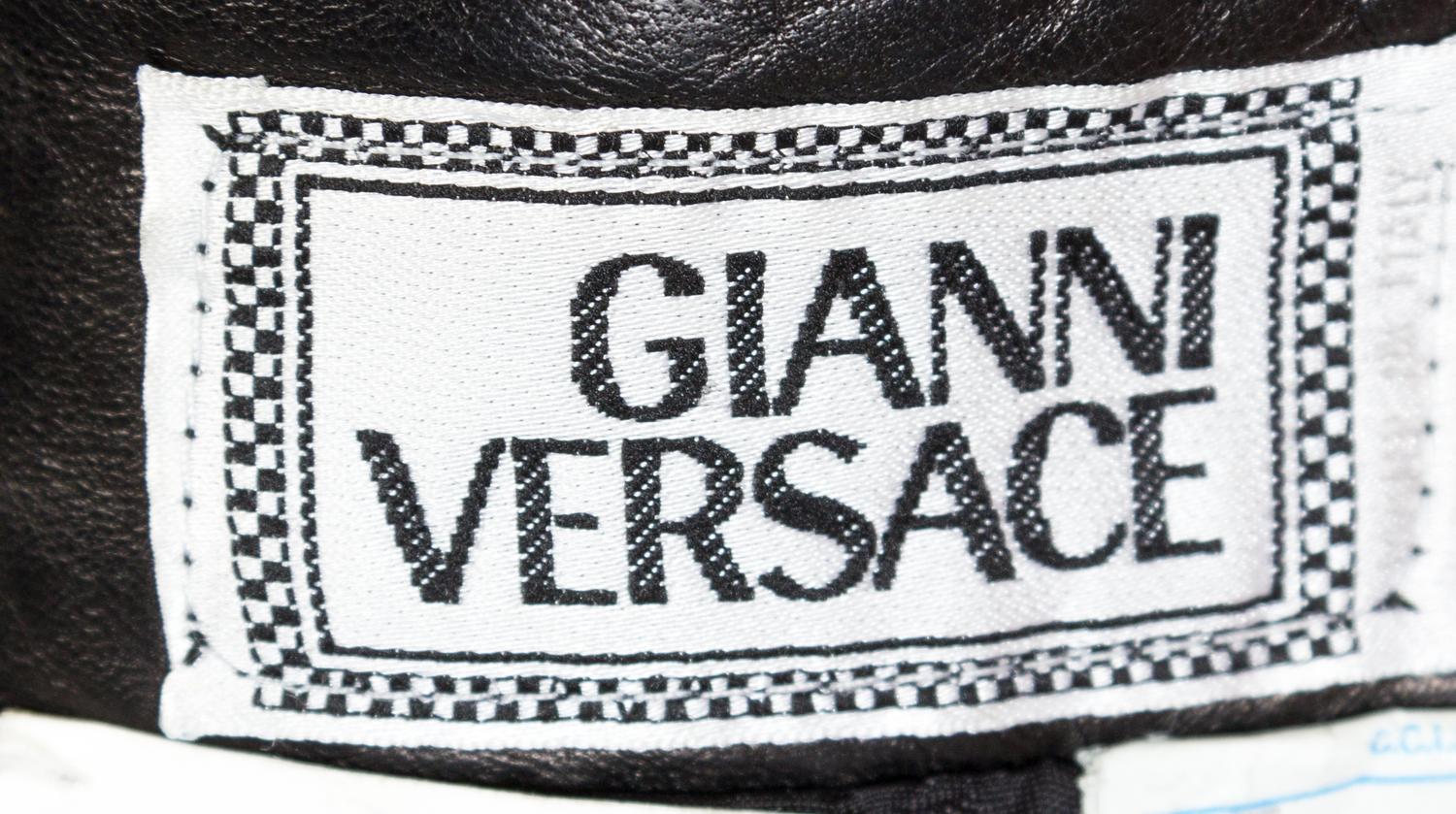 A Gianni Versace Black Leather Bondage Skirt, Size 42.