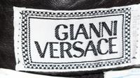 A Gianni Versace Black Leather Bondage Skirt, Size 42.