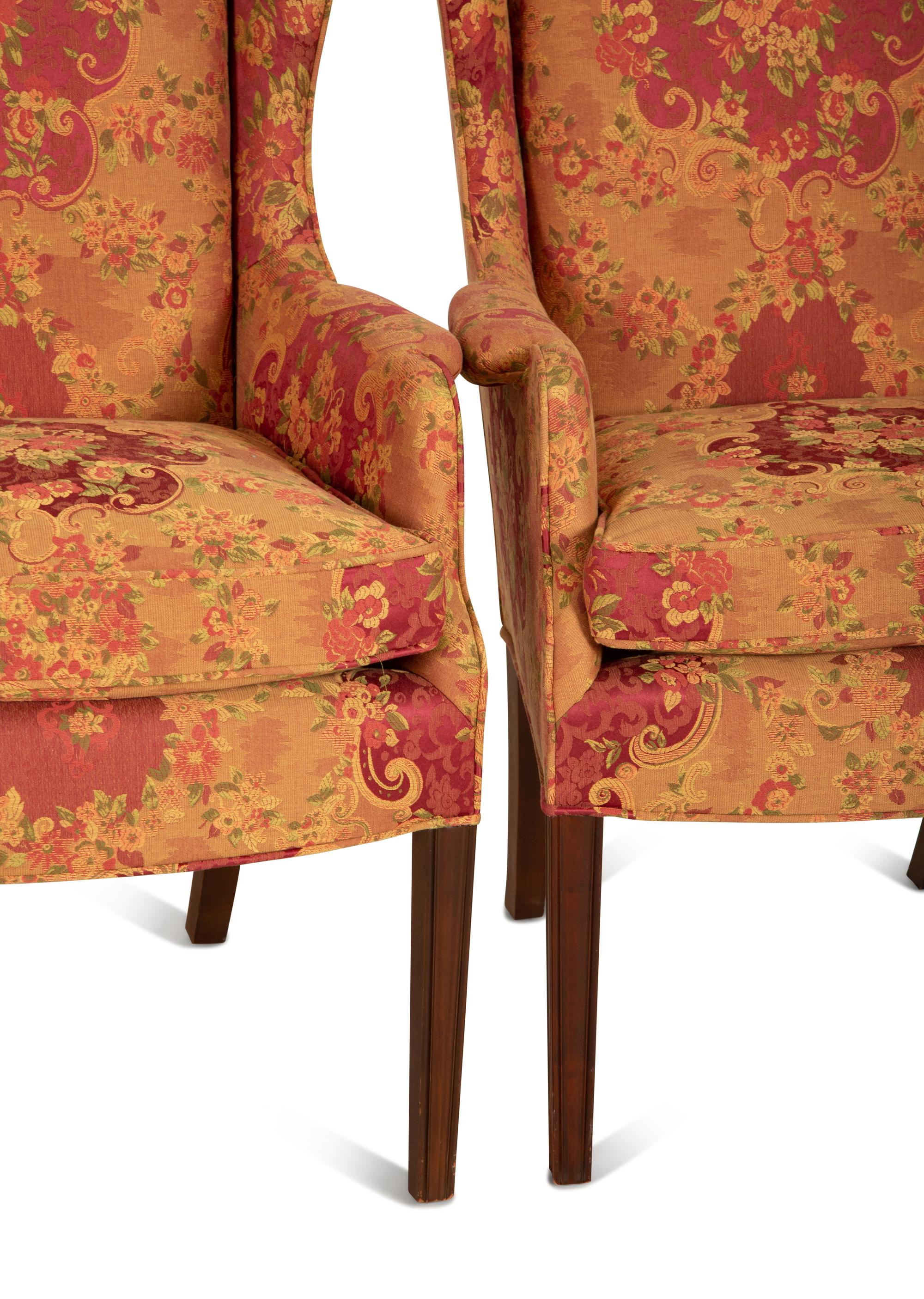A Set of Seven George III Style Mahogany Wing Back Armchairs