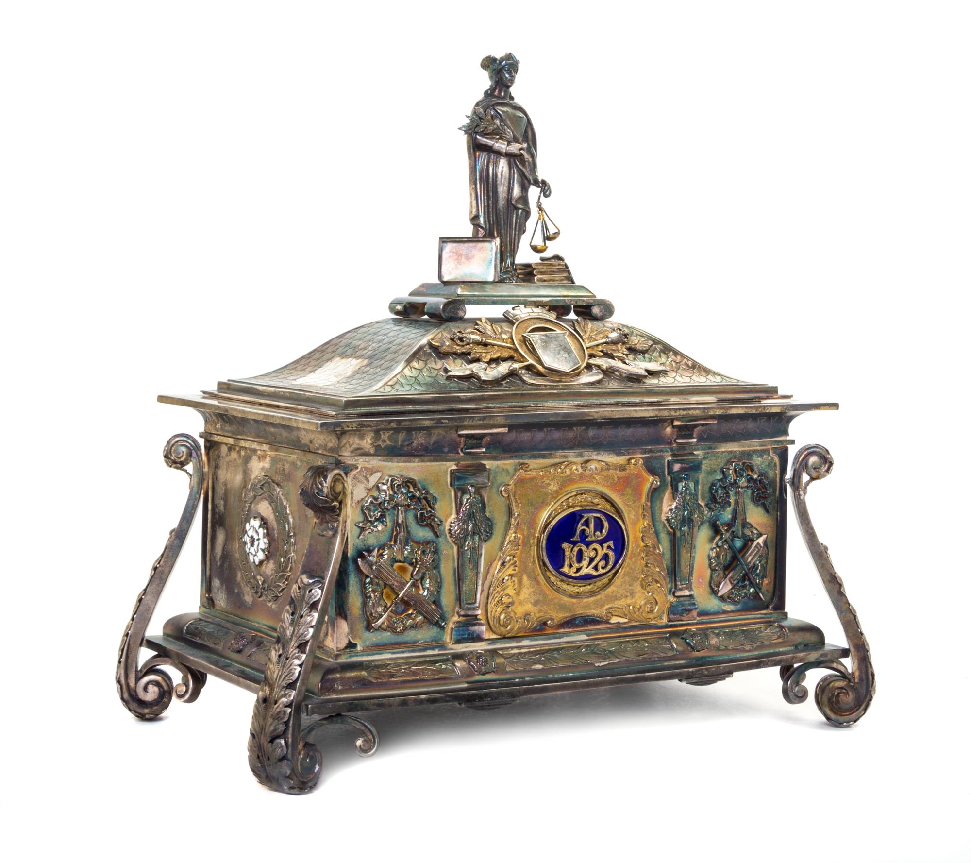 A George V Enameled Silver Casket, Maker's Mark CER, Birmingham, 1925, of rectangular form, the domed lift-off cover surmounted by a fi