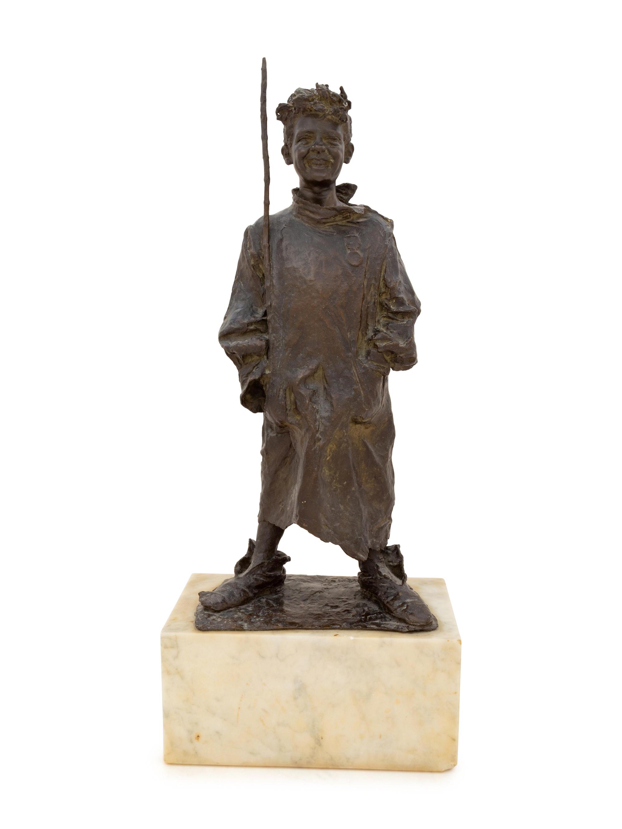 A Bronze Figure of a Boy