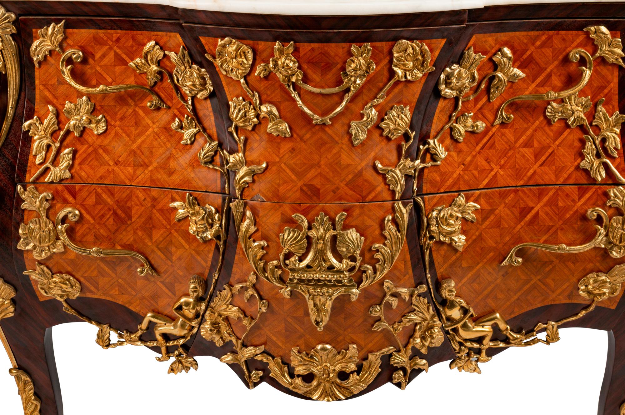 A Louis XV Style Gilt-Bronze-Mounted Parquetry Commode