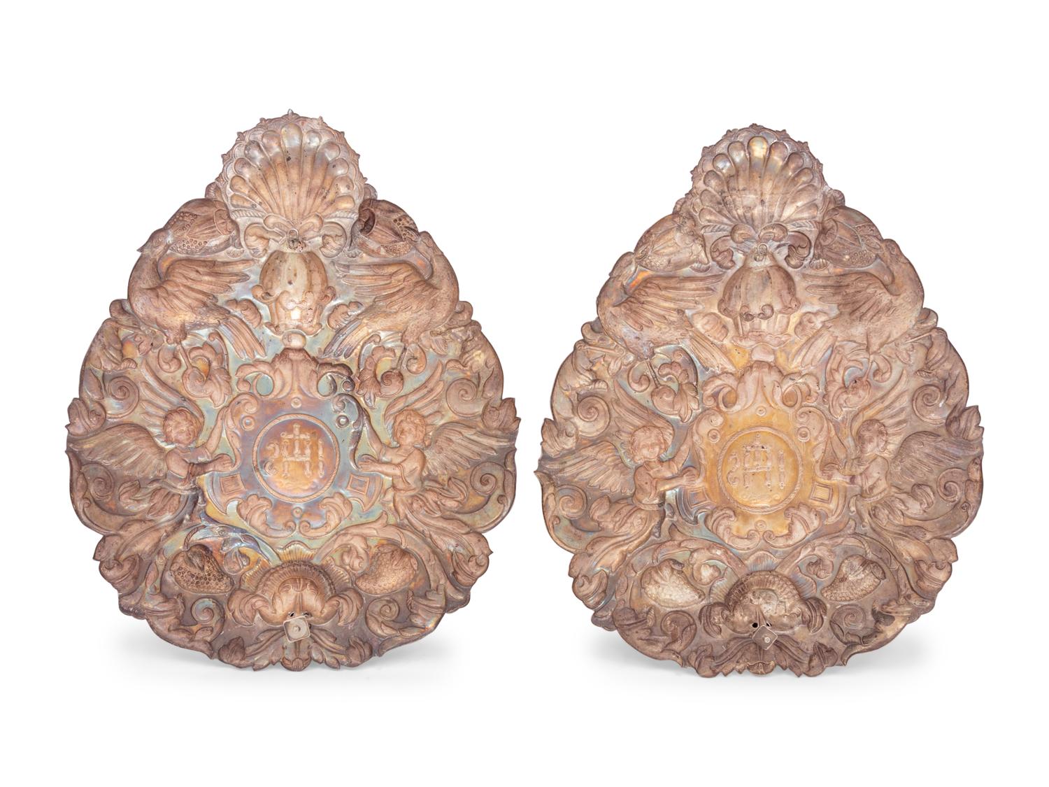 A Pair of Continental Silver Ecclesiastic Two-Light Sconces