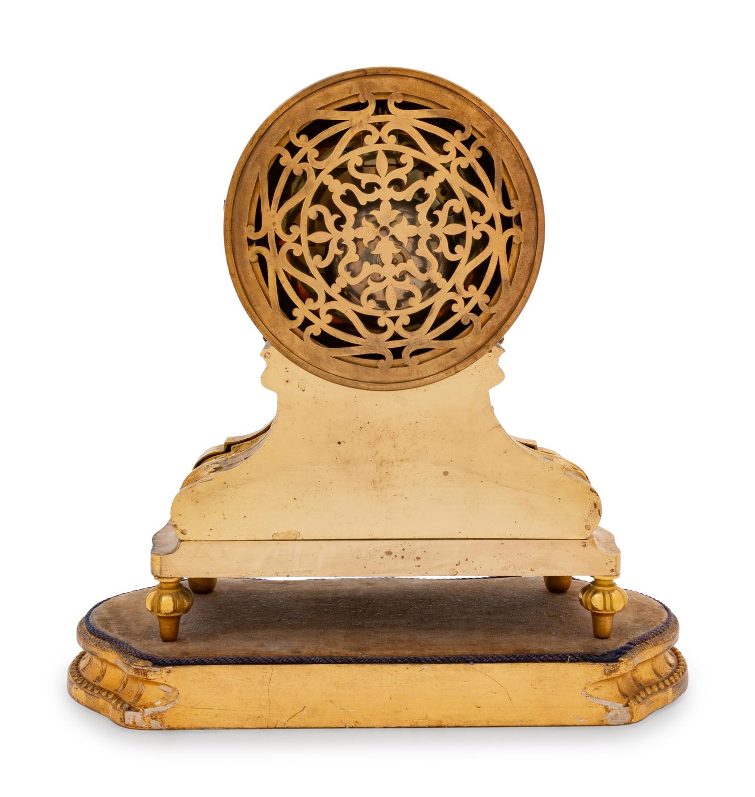A Louis XVI Style Gilt Bronze and Sèvres Style Porcelain Inset Mantel Clock