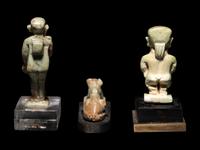 Three Egyptian Faience Amulets Including a Pataikos, a Harpocrates, and a Recumbent Lion