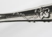 Two American Silver Flatware Servers, Tiffany & Co., New York, NY, Vine pattern, one engraved with a script monogram.