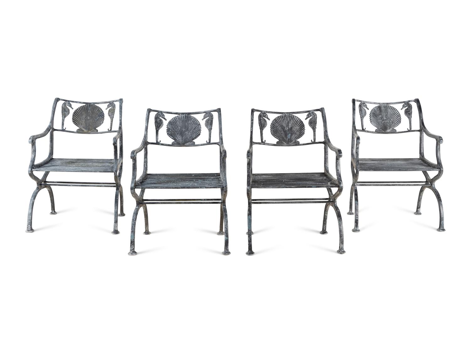 Four Wrought Iron Armchairs